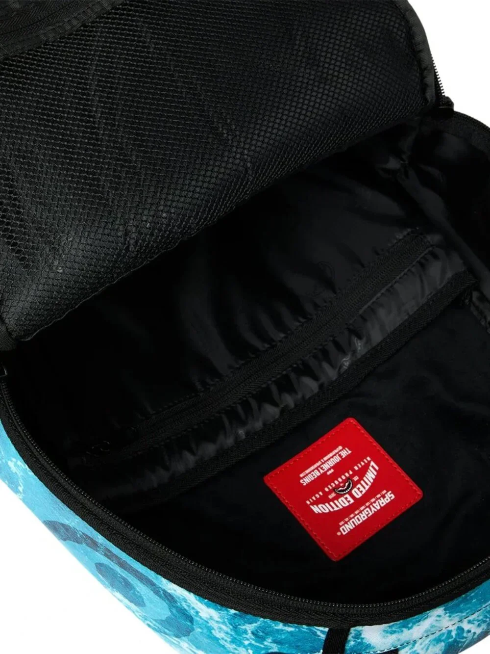 HIGH TIDE SHARKS IN PARIS BACKPACK SPRAYGROUND